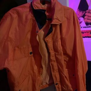 orange windbreaker